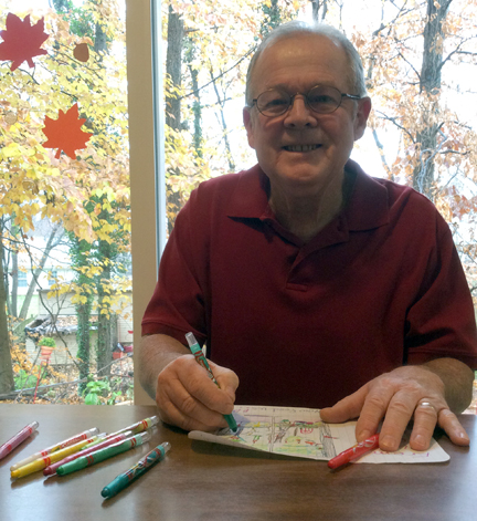 Wayne is trying out some of the Twistables by Crayola.