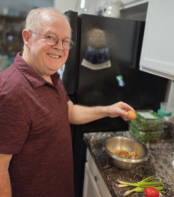 Wayne is creating a delicious meatloaf.